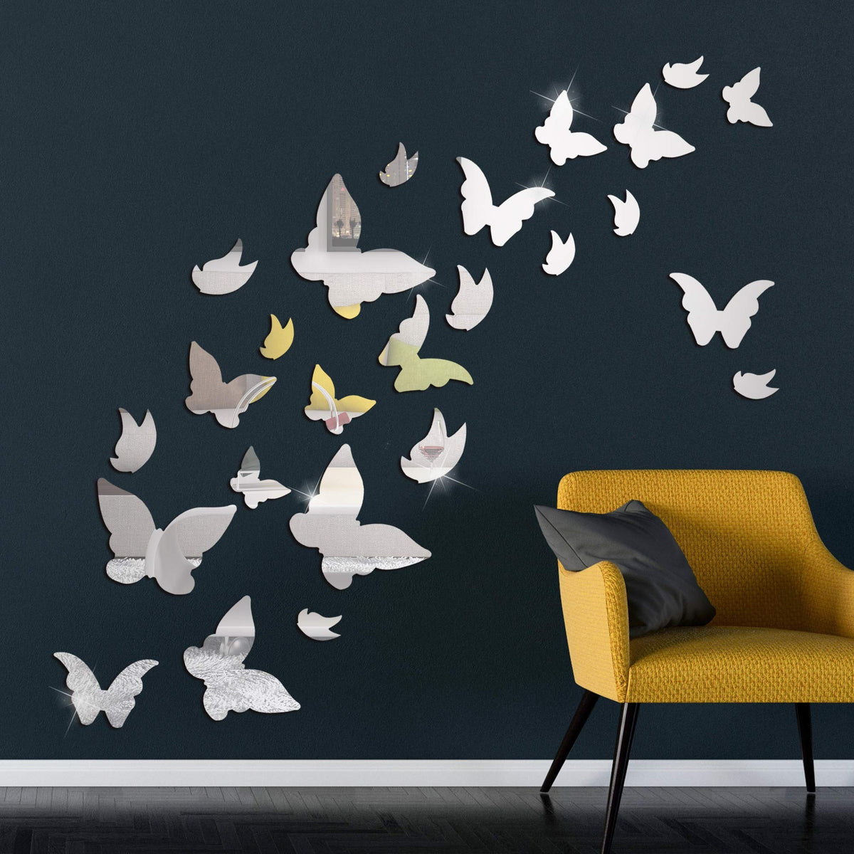 Silver mirror butterfly wall decorations on dark wall