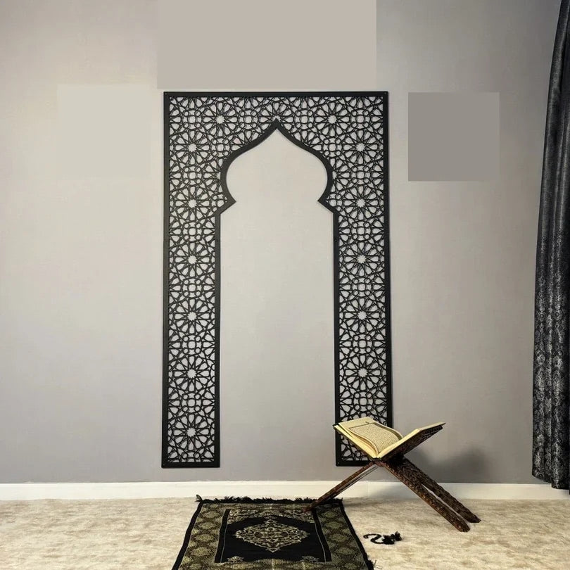 Black geometric mihrab wall arch close-up